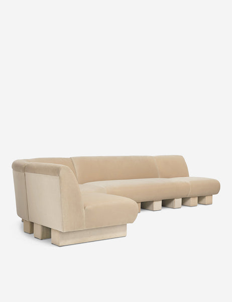 #color::brie-classic-velvet #configuration::left-facing #size::142-W | Angled view of the Lena left-facing beige velvet sectional sofa with upholstered beam legs.