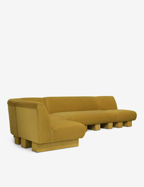 #color::goldenrod-plush-velvet #configuration::left-facing #size::142-W | Angled view of the Lena left-facing yellow velvet sectional sofa with upholstered beam legs.