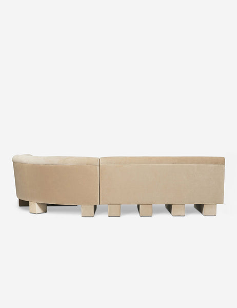 #color::brie-classic-Velvet #configuration::right-facing #size::114-W | Rear view of the entire Lena left-facing beige velvet sectional sofa with upholstered beam legs.