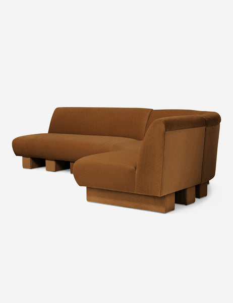 #color::Cognac-Velvet #configuration::right-facing #size::114-W | Angled view of the Lena left-facing cognac velvet sectional sofa with upholstered beam legs.