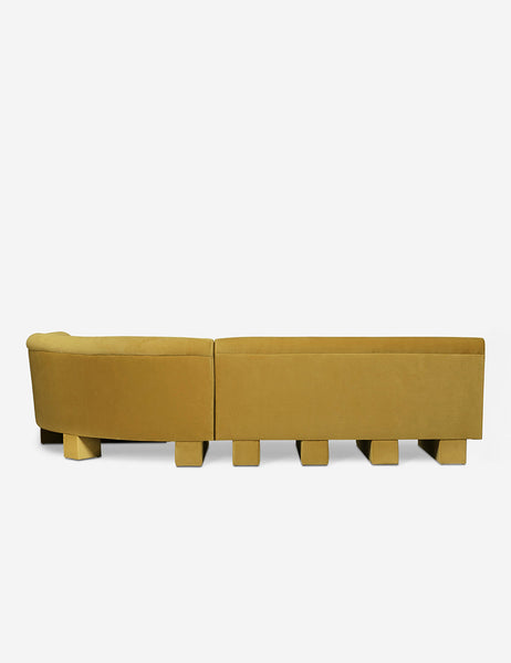 #color::goldenrod-plush-velvet #configuration::right-facing #size::114-W | Rear view of the entire Lena right-facing yellow velvet sectional sofa with upholstered beam legs.