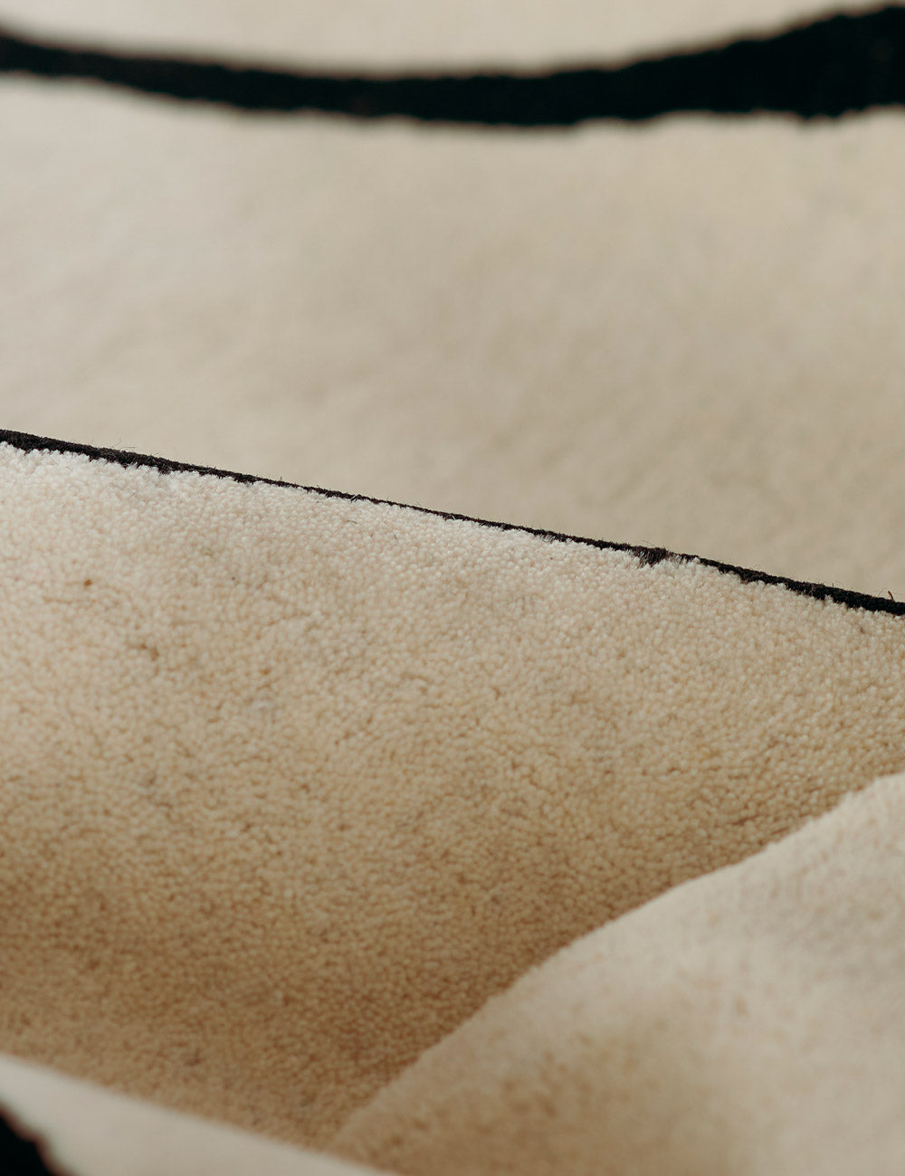 The Shayla rug folded over itself