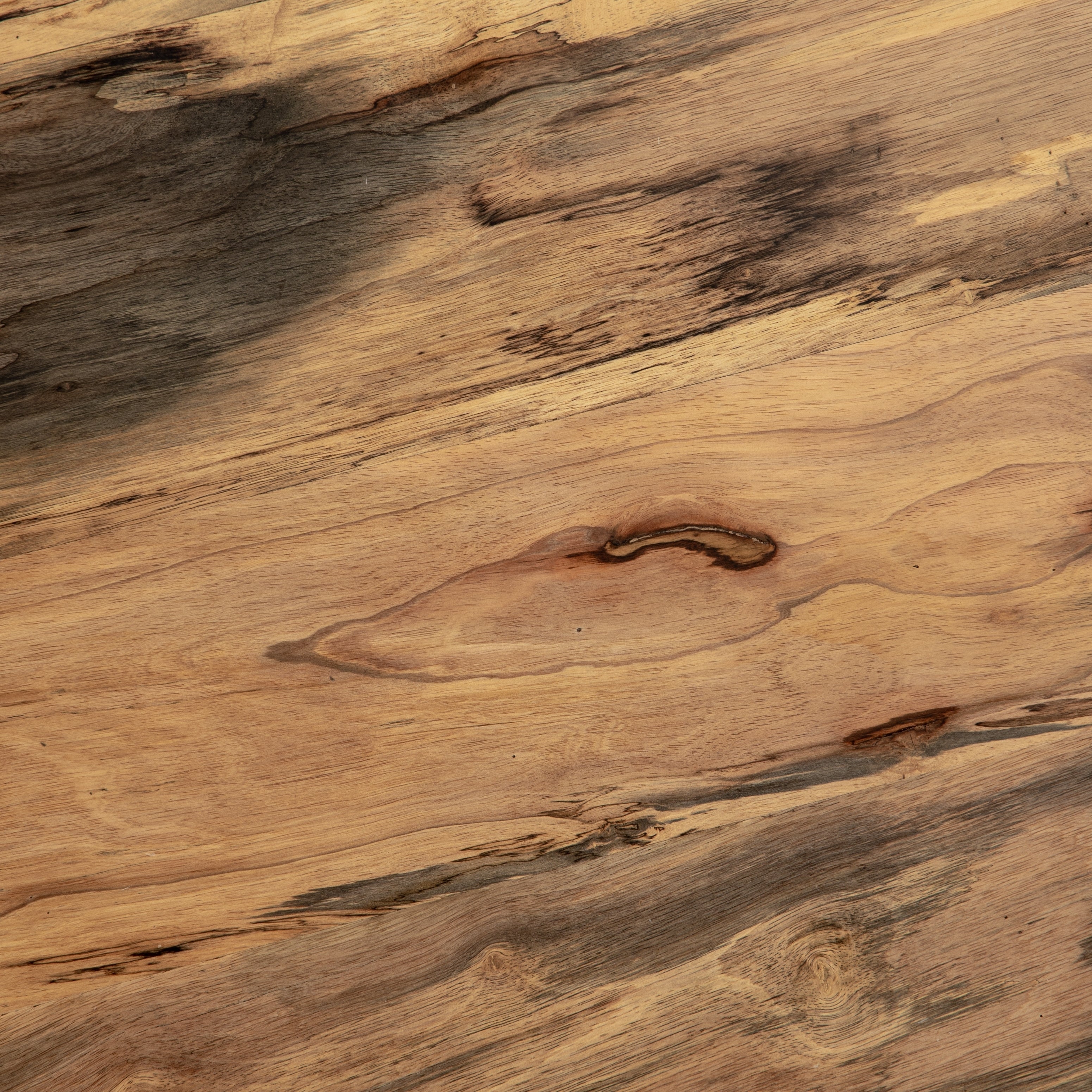 Close up of the natural primavera wood construction of the Boni round coffee table