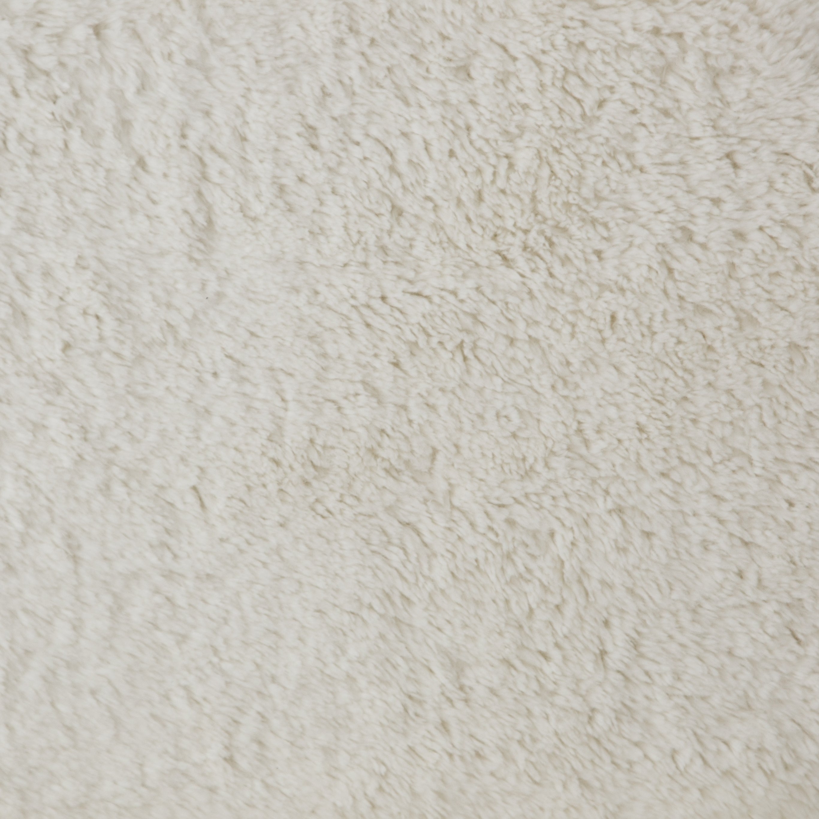 Close-up of the white plush fabric on the Amanda white plush upholstered accent chair