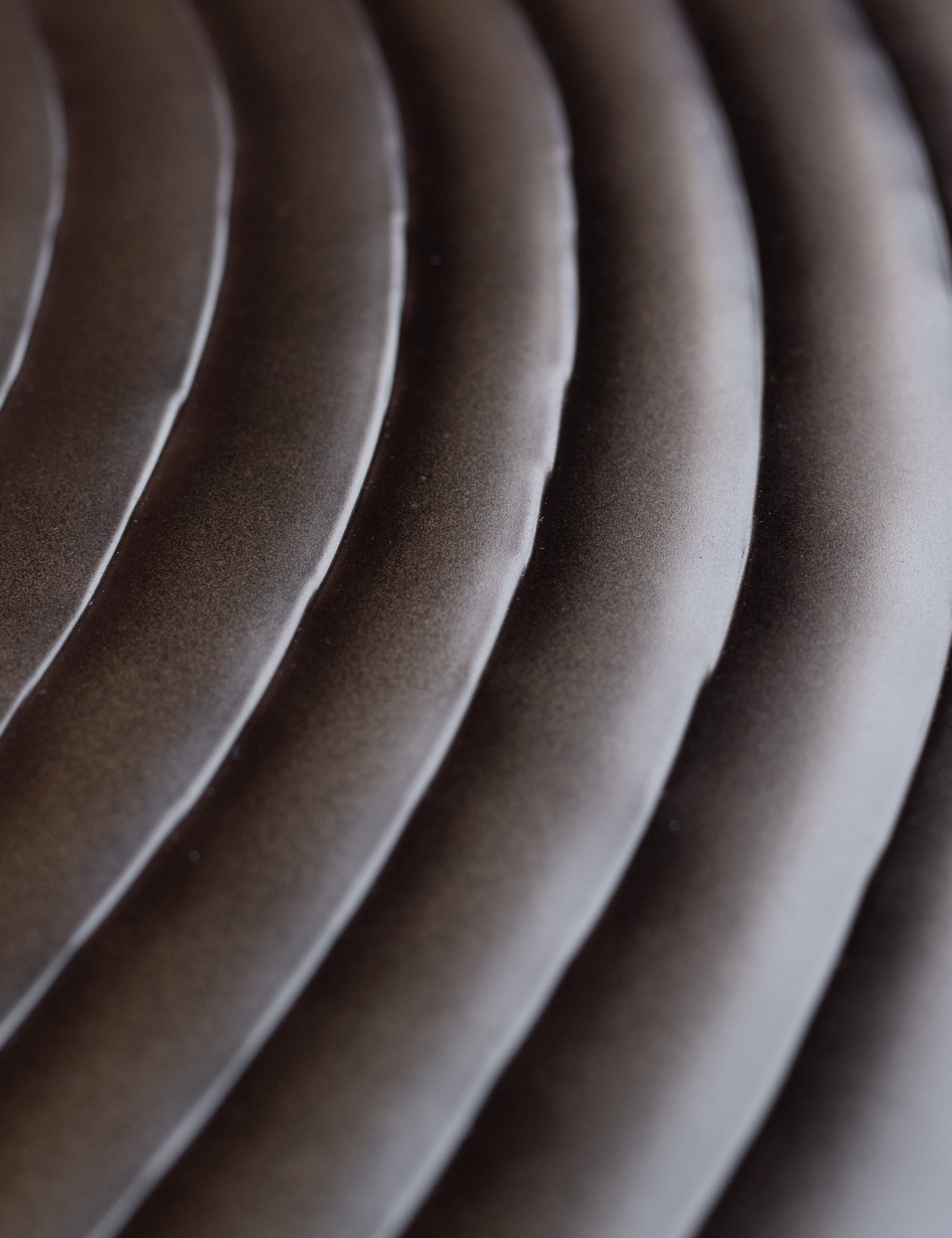 Close up of the repousse ringed detail on the Hosanna Round Coffee Table
