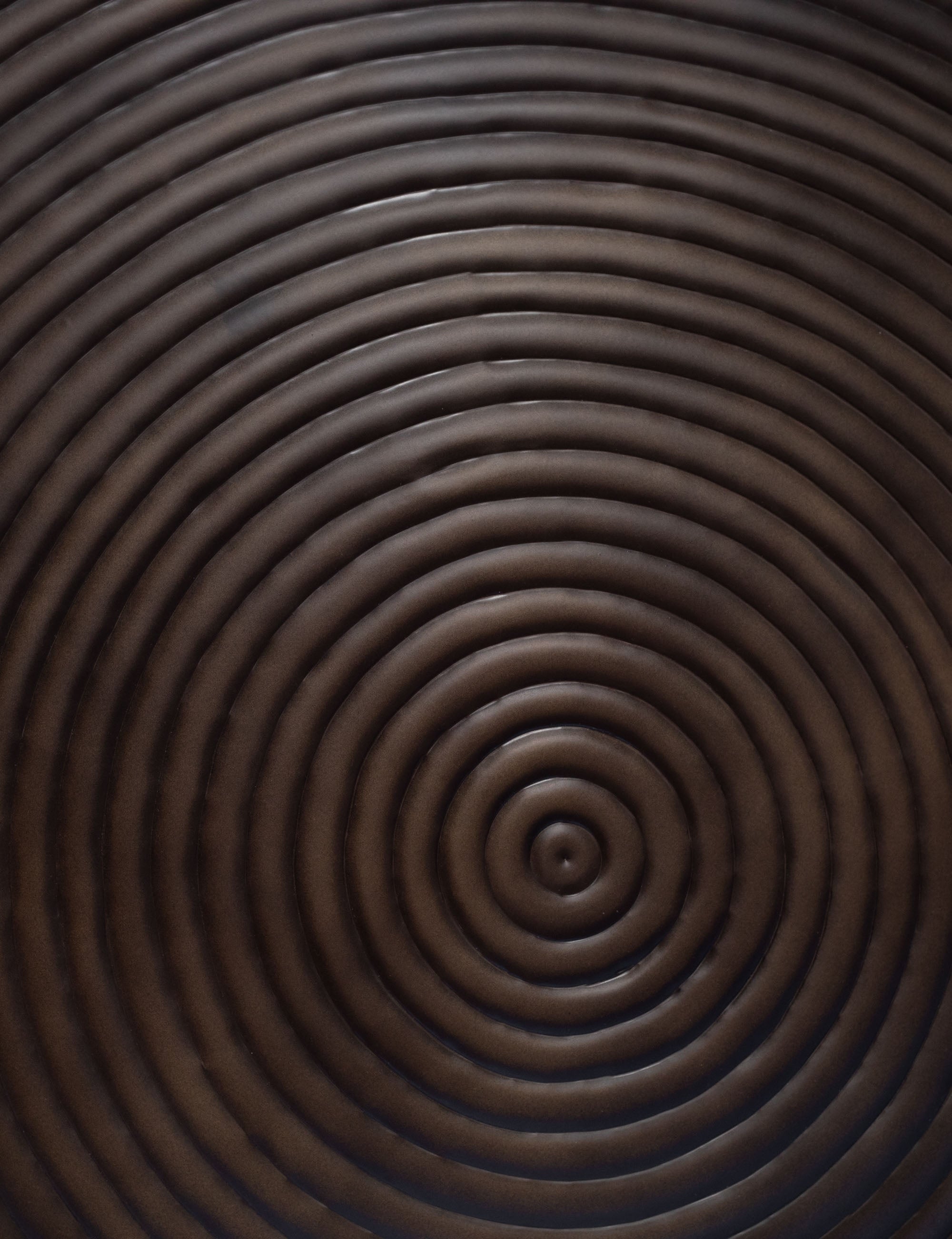 The repousse ringed detail on the Hosanna Round Coffee Table