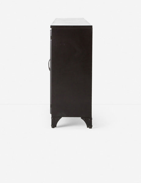 | Side view of the Marjorie black iron sideboard with glass paneled doors
